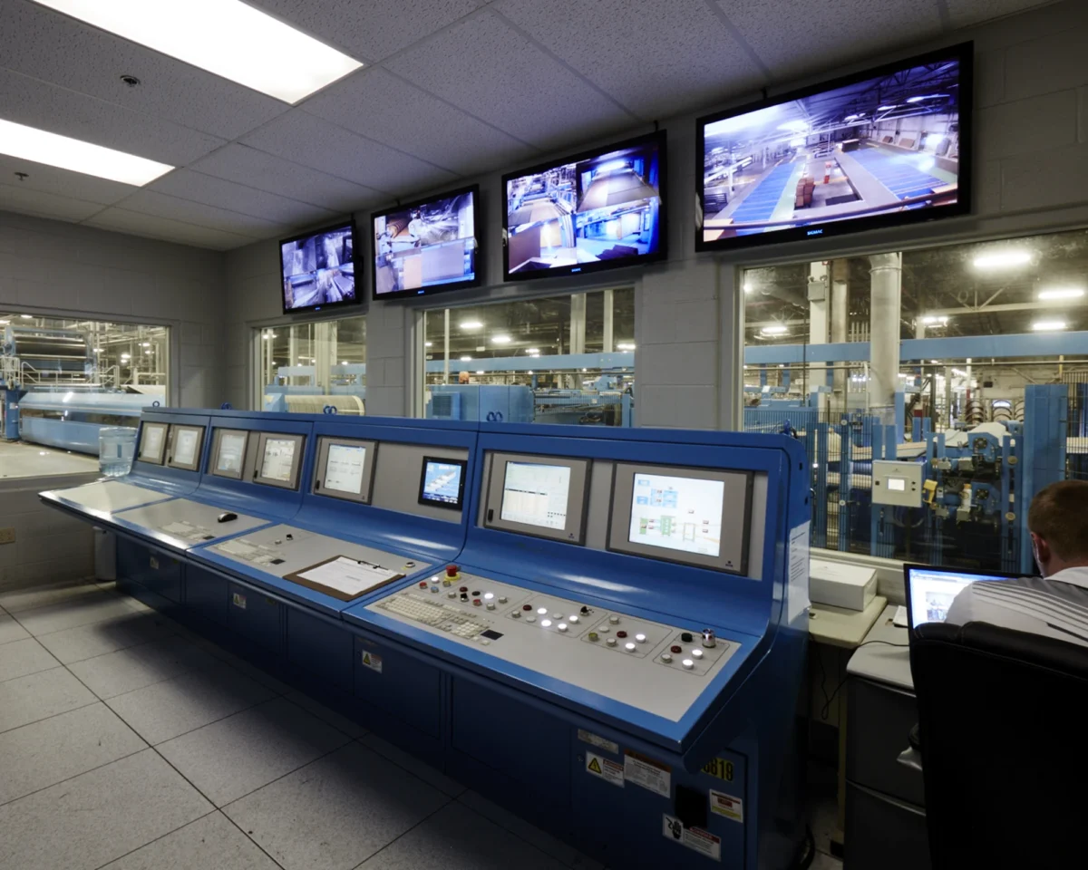 Digital display screens in an industrial facility